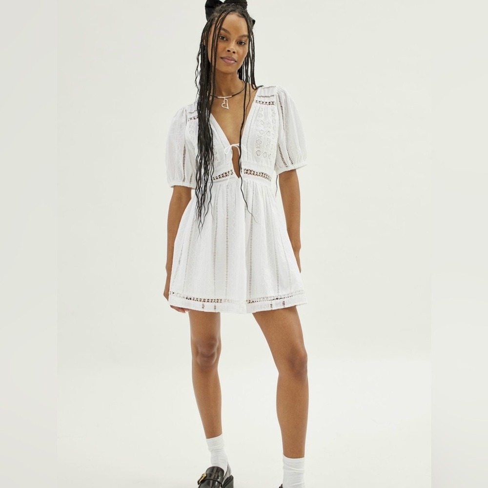 Urban Outfitters open back tie front lace romper
